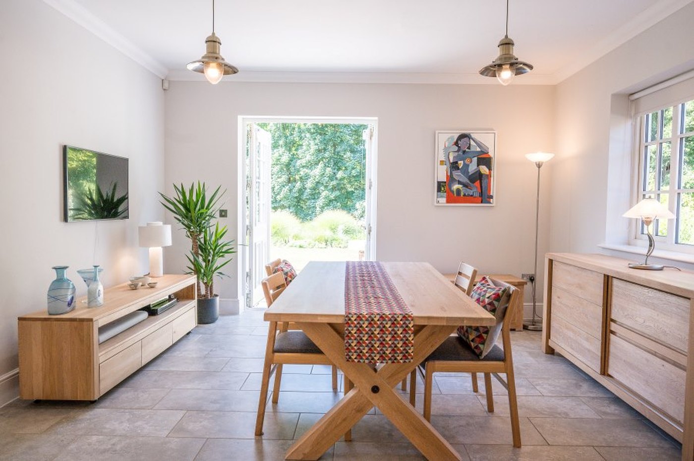 The breakfast and dining area at Monmouth House, opening onto the terrace