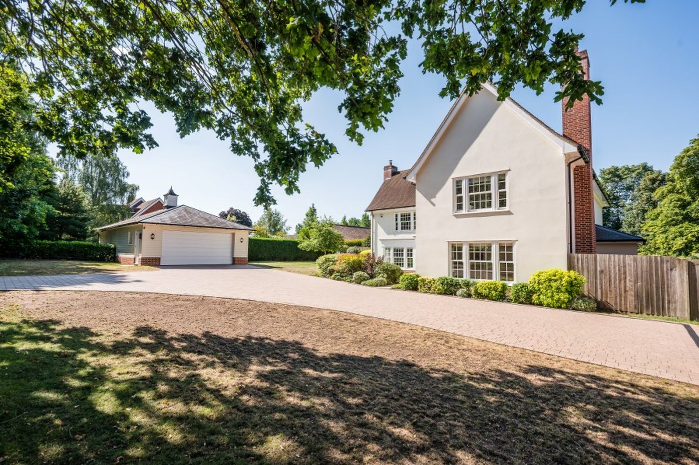 Monmouth House seen from the driveway, with the detached double garage